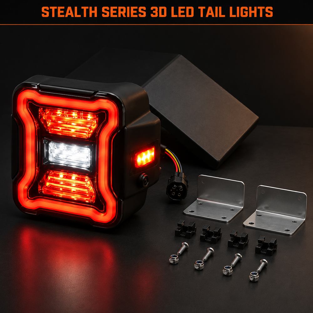 Single Stealth Series 3D LED tail light unit displayed with complete mounting hardware kit including brackets screws and clips on dark surface