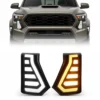 2024-2026 Toyota Tacoma fang lights pair showing white DRL and amber turn signal modes below the installed front view