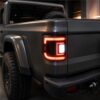 c shape jeep gladiator led tail lights close up red LED matrix white reverse area