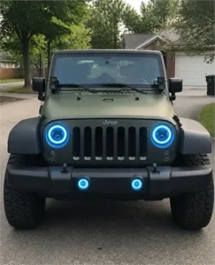 Buyer review photo of a Jeep Wrangler with blue halo headlights in a suburban driveway