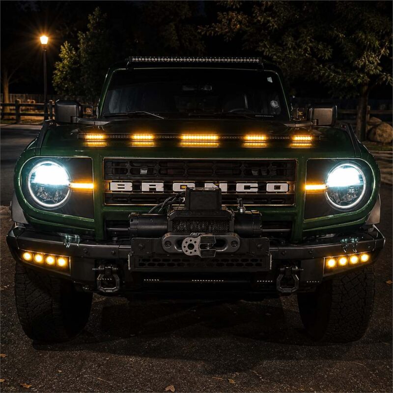 Ford Bronco hood protector with amber LED lighting installed at night