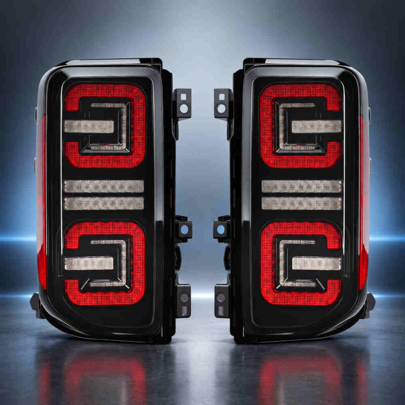 Smoked Bronco LED tail light assembly pair with dual-row red optical lighting design