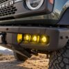 Close-up of triple amber LED pods fitted to a Ford Bronco steel modular front bumper
