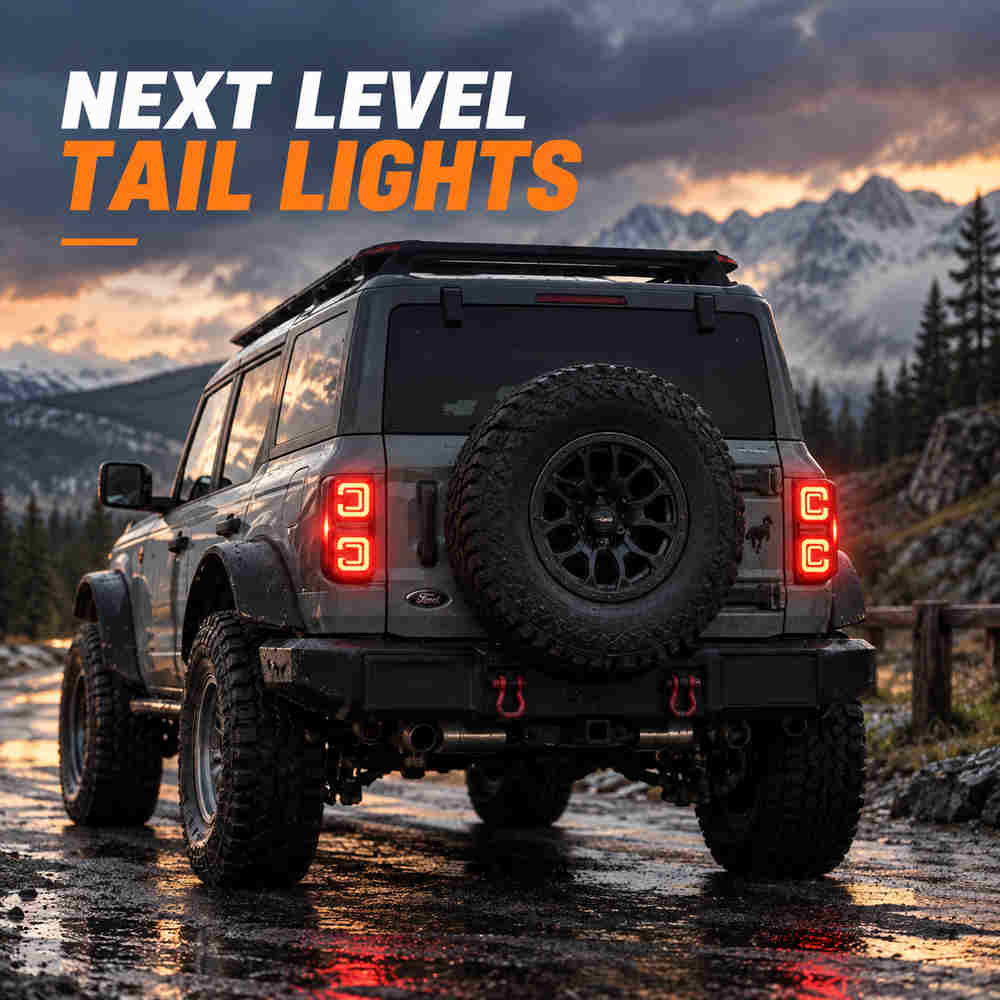 Ford Bronco smoked tail lights illuminated on rear of off-road Bronco at sunset