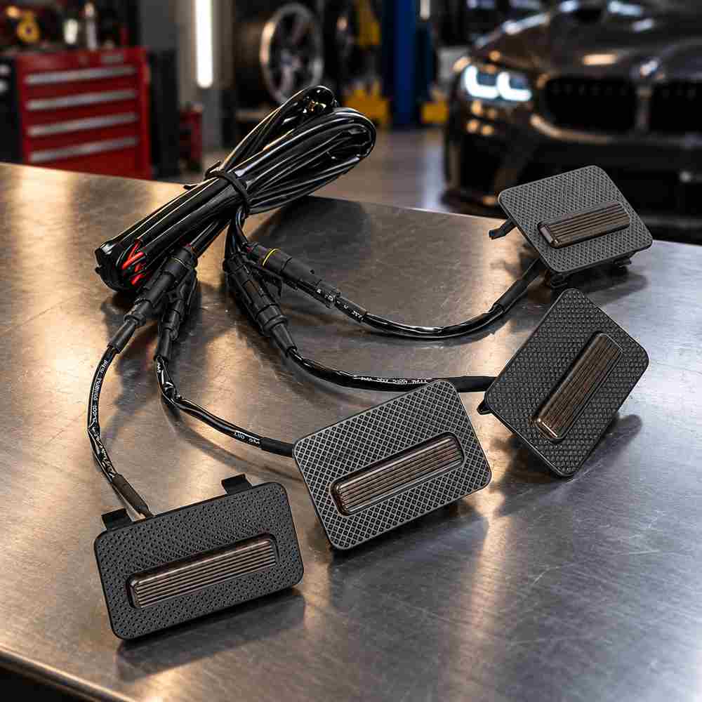 Raptor lights for Tacoma kit with four smoked amber LED modules and wiring harness