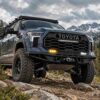 Tundra fog lights displaying white DRL and amber turn signal lighting modes on rugged off-road build