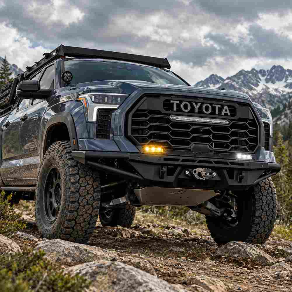 Tundra fog lights displaying white DRL and amber turn signal lighting modes on rugged off-road build