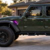 Purple Jeep JL fender lights installed in the factory vent area